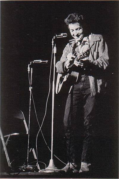 Bob Dylan performing at St. Lawrence University on November 26th, 1963. Dylan was a key figure in the protest movement.