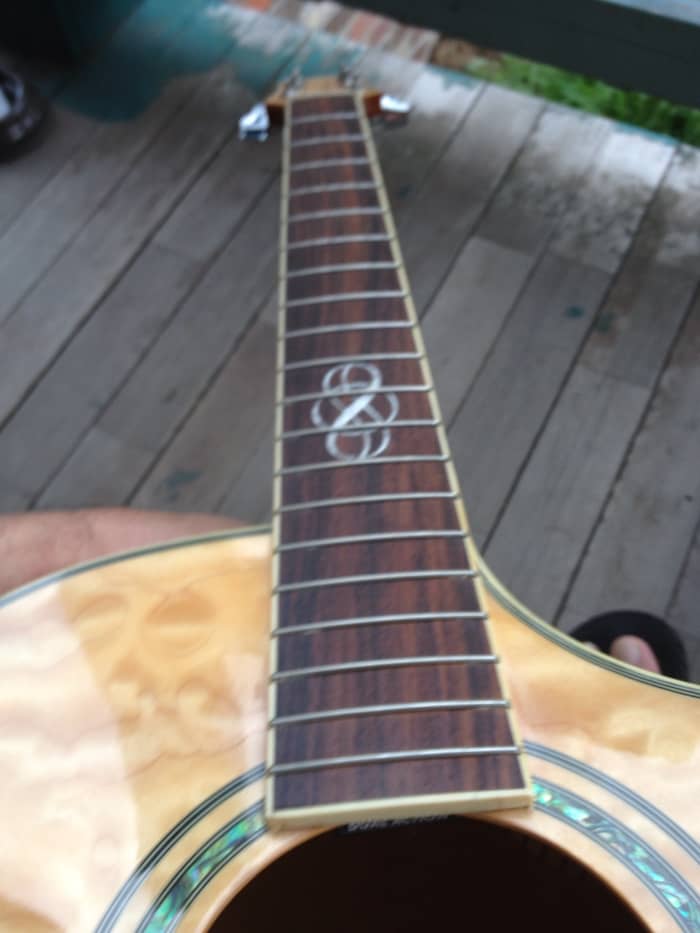 Always inspect the neck while going over your guitar. As you can see, the frets are now fresh and alive with rich color.