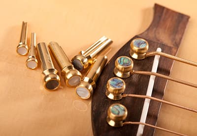 String pegs hold your string into place into the body of the guitar. If one comes loose, so does your string.