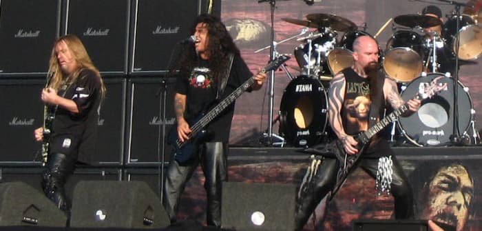 Slayer guitarists Jeff Hanneman (left) and Kerry King (right), and bassist Tom Araya (center).