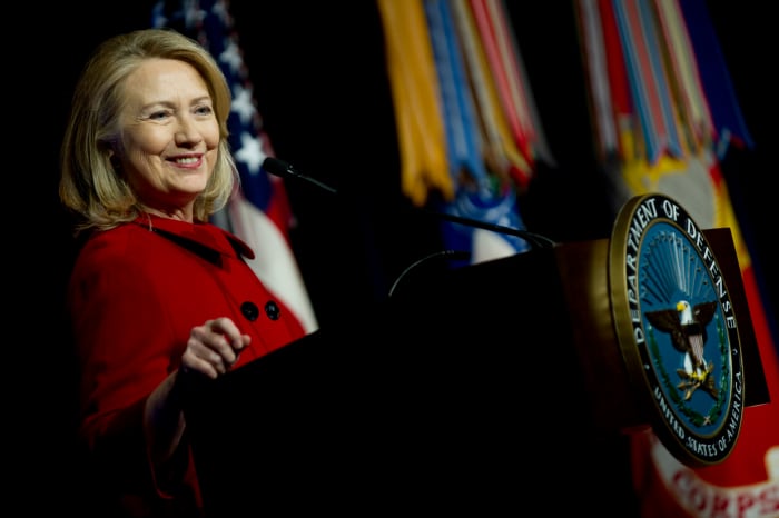 No matter what you may think of Hillary Clinton's politics, you have to admit that that older woman can rock a pantsuit and power colors. Go, you powerful lady!