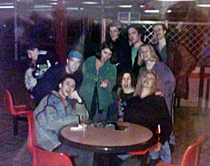 Hanging out at the motorway services - Carl (Bollie) seated on the left; Carol in green jacket (standing, centre); me seated on the right, next to Grayson, with Adele (purple jacket) standing behind me. Standing at the back (right) is Pete.