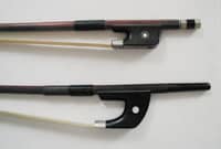 The German bow has an extension to the stick, and the frog is deeper, sloping more towards the tip.