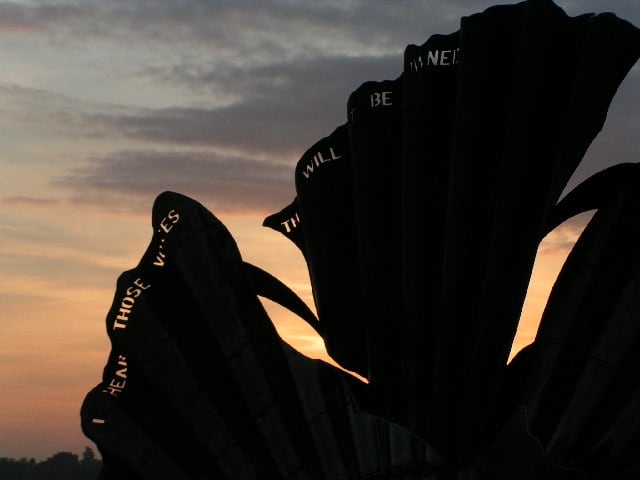 Maggie Hamblin's tribute to 'Peter Grimes' in the form of a scallop, with words from the libretto around the edge. It is displayed on the beach at Aldeburgh where Britten lived.