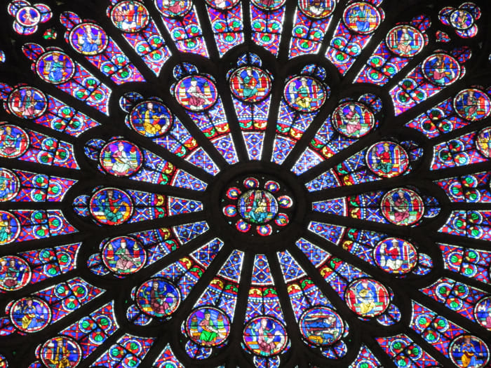 The stained glass of the Notre Dame cathedral in Paris, France before the structure burned in 2019.