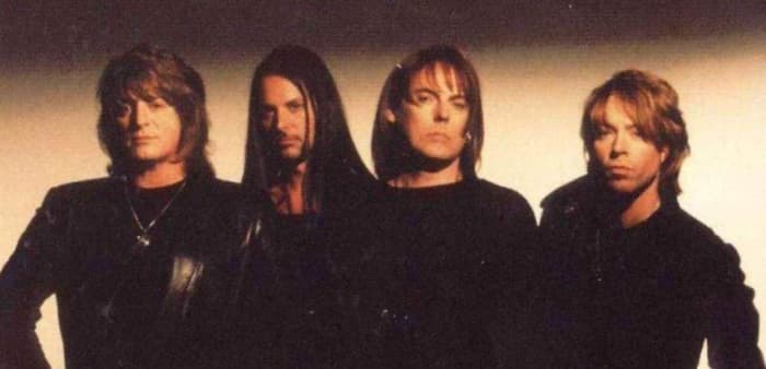 Dokken 1999, L-R: Mick Brown (drums), Reb Beach (guitar), Don Dokken (vocals), Jeff Pilson (bass)