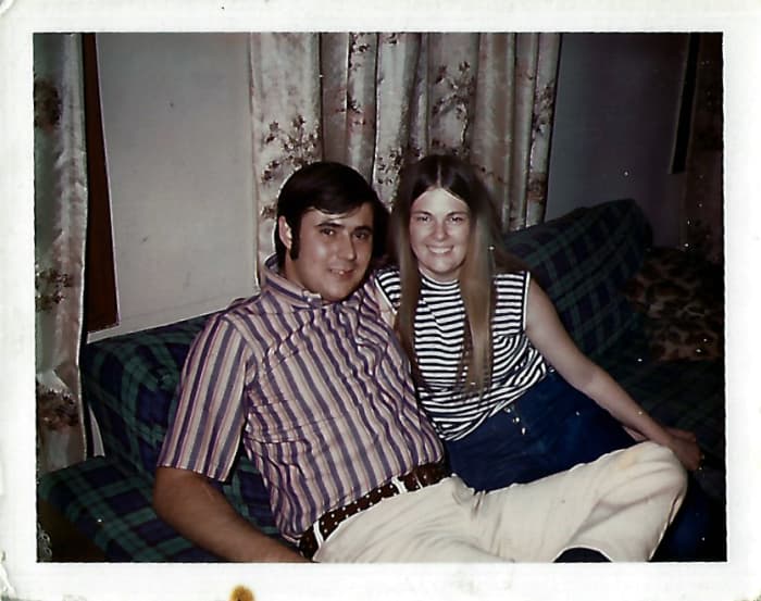 My uncle and his first wife show off their late 60s style, including striped shirts, sideburns for men, button up jeans, and women's long hair, usually parted down the center.