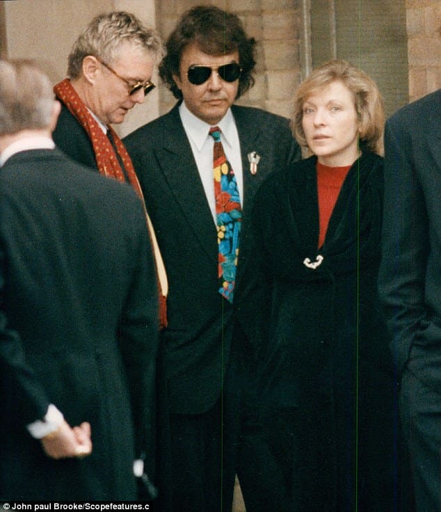 "Love of my life you've hurt me/You've broken my heart, and now you leave me"....Queen drummer Roger Taylor, Dave Clark and Mary at Freddie's funeral.