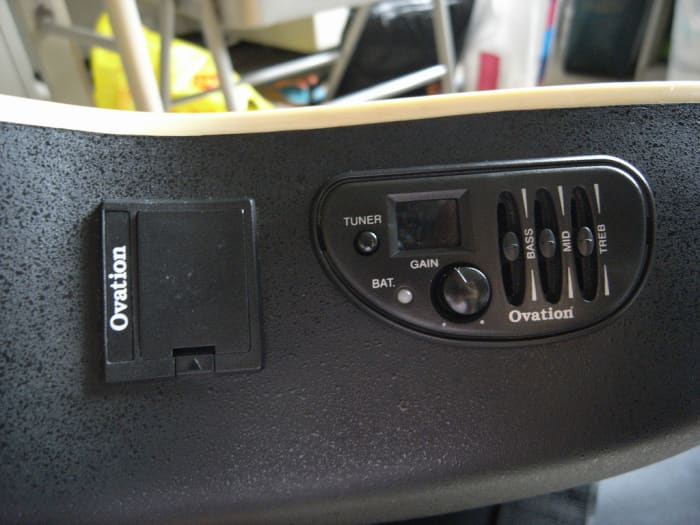 Top/back and electronics of an Ovation guitar.