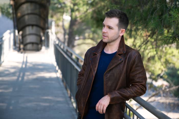 Having lost a childhood friend to depression and addiction, Griffith Frank describes his song "Reach Out" as a call to action for anyone facing a personal crisis too big to face alone. Esteban Calderón and Caitlin Timmins co-wrote the song with him.