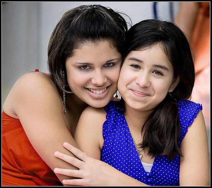 Genuine smiles are a form of beauty. These two friends (Yami and Vale) bring out each others grins. Photo by Edwin Dalorzo