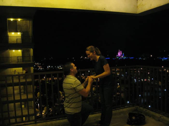 The Stokers. Proposal at a Disney Hotel, before fireworks display. Cinderella's Castle in the background.