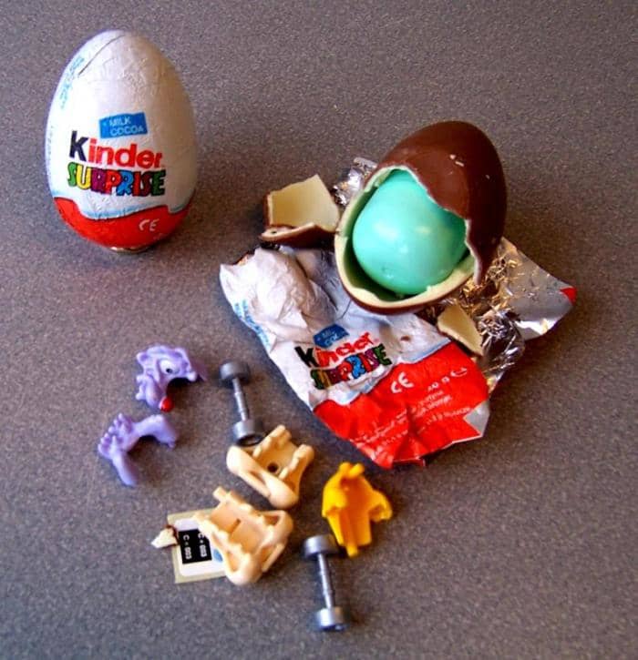 Kinder Eggs are a DELICIOUS egg-shaped coating of chocolate over a choking hazard. Toys are inside the little capsule in the egg. This toy came in multiple parts and with a set of instructions.