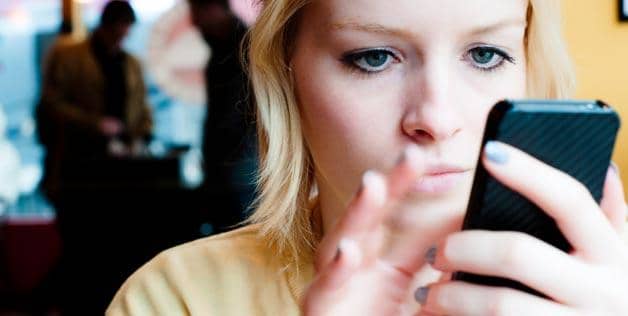 If your boyfriend's phone rings or beeps, you might wonder who it is. Asking, however, can make you look insecure.