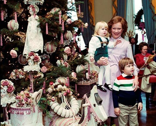Mrs. Carter and her 1980 theme tree, "Old Fashion Victorian Christmas"