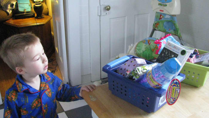 My son finding his Easter basket . Inside was bubbles, star stickers for his room, Cars bandaids...