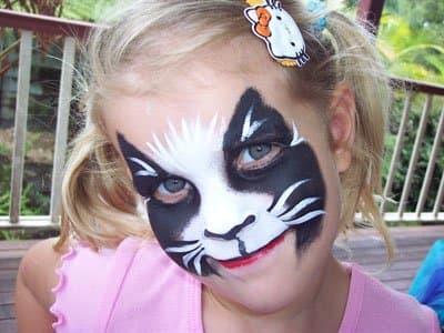 You can paint your child's face in the design of particular cat breeds or colorations, such as the tuxedo cat.