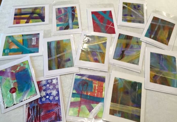 These cards made from original abstract paintings have been bagged so I can sell them at my studio.