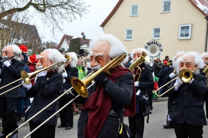 These trombone players are dressed as Albert Einstein, who shares a birthday with National Pi day, March 14. Dress as the famous mathematician to honor them both.