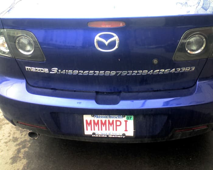 Don't hide your love of math. Be enthusiastic. Show your love of math. This driver broadcasts his or her love of math on a license plate.
