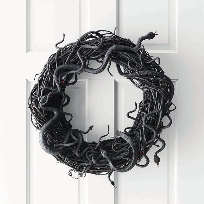 This was the first Halloween wreath that I made. I had bought a bunch of things to decorate for Halloween, among them a bag of snakes.