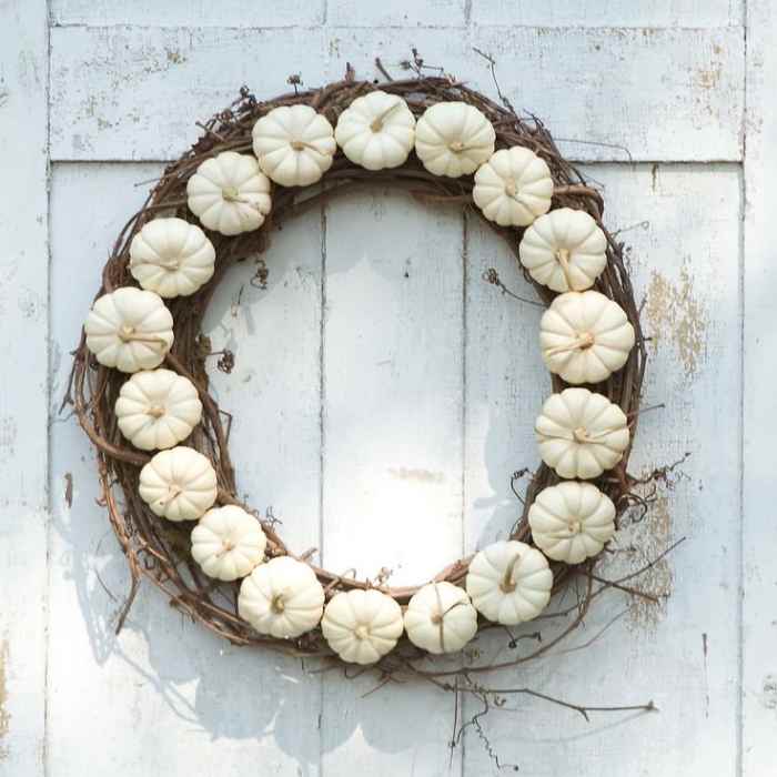 Wreath made using single color pumpkins. You can change this up to suit your decor or your design scheme.