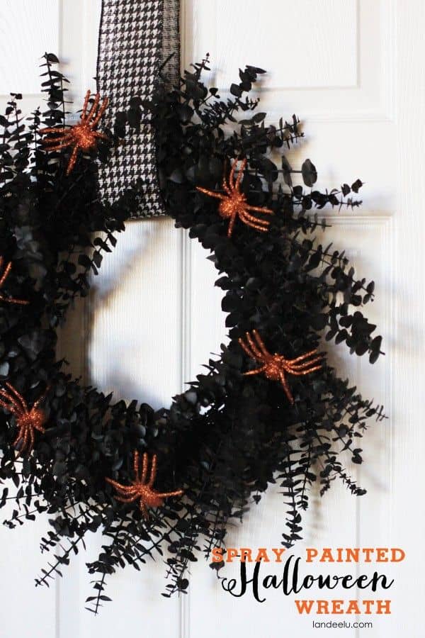 This one is easy enough. Make a wreath using eucalyptus. Spray paint using black. Add some creepy-crawlies.