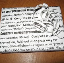 You can print out personalized wrapping paper using your computer printer. Works for a small gift. Type any message you want, then copy and paste to fill the whole page.