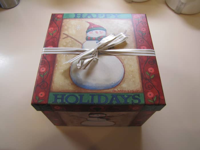Place your food gift for the office in a decorated container. This one needs no additional wrapping, so I just tied it with a ribbon.