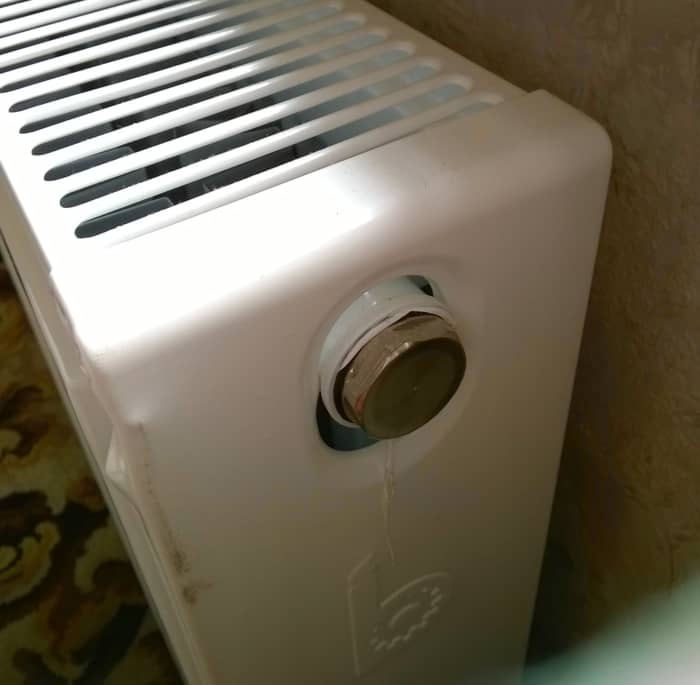 Touch your finger off a grounded (earthed) appliance such as a radiator to drain charge from your body before handling electronic components