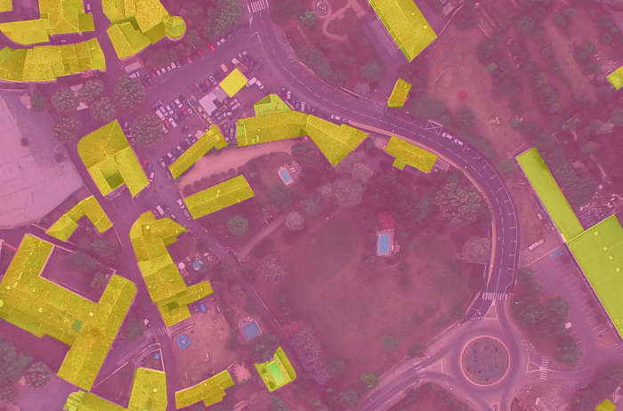 Image classification techniques were also used to find buildings in this image. It's not perfect but I'd say it's pretty good.