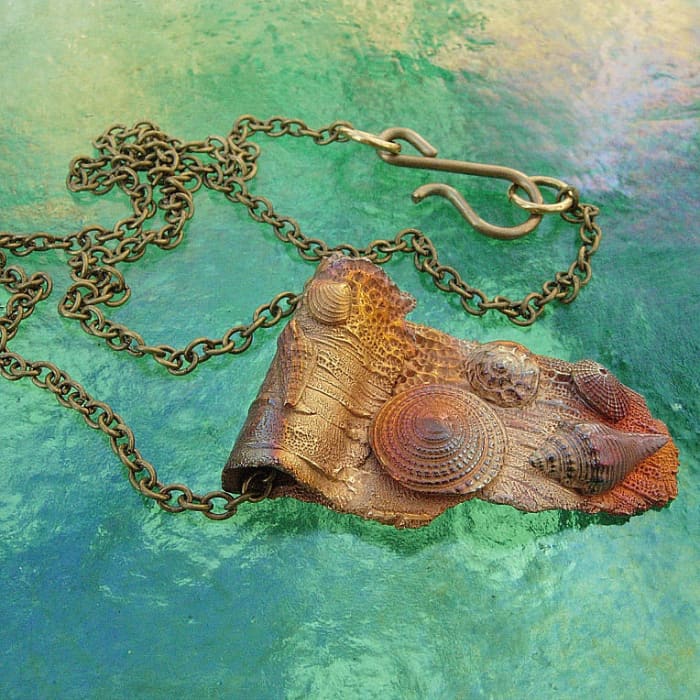 "Catch the Wave III" bronze pendant with torch/flame patina