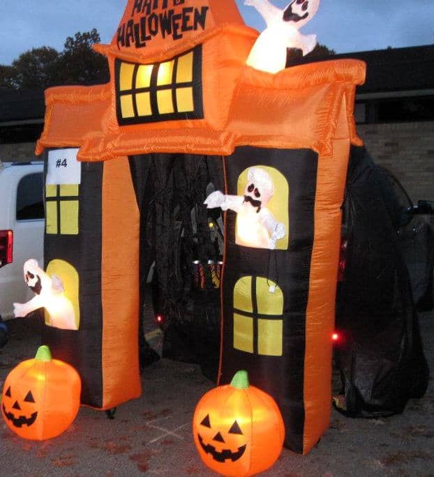 This blow-up haunted mansion archway in front of a trunk was the kids' favorite at this Trunk or Treat!