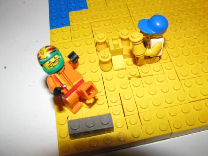 Lego figures and background for film. See shadow on bottom? Watch for this and set your desk lamps to avoid it.