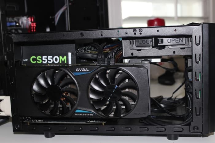 The shoebox size of the CM 130 along with full-sized PSU and GPU capabilities make it one of the better options. Pictured is a CM130 with an additional red LED fan.