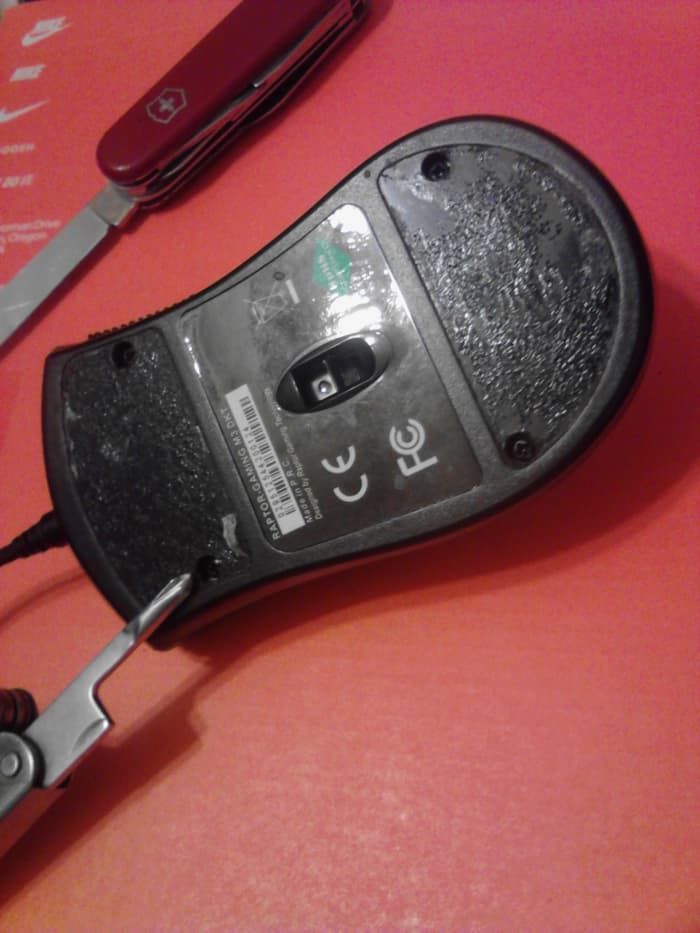 All covers are removed here to reveal 4 screws. Your mouse may vary. My mouse uses standard philips head screws. Your mouse may use less common screws so be prepared to buy a special screwdriver if needed.