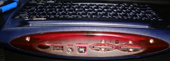 On the rear of the Dana, starting from the left, there is an infrared port, a USB port for a printer, AC adapter port, USB port for connection to a computer, and two SD card slots that support up to 1GB each.