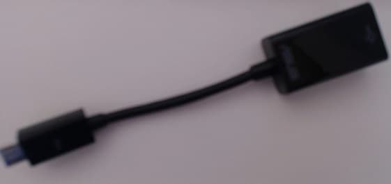 The Asus adapter, included in the package, allows you to connect other device to your Zenfone, so that you can charge them and use your phone as a power bank