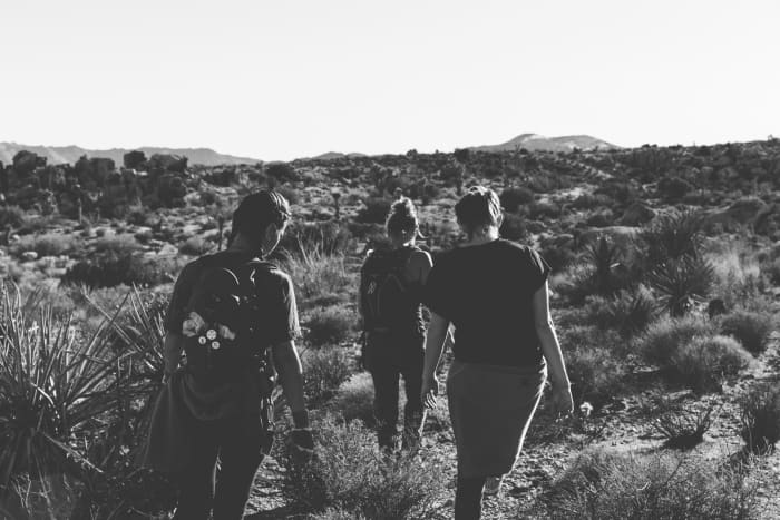 You can use the iPhone camera filters to take pictures in black and white
