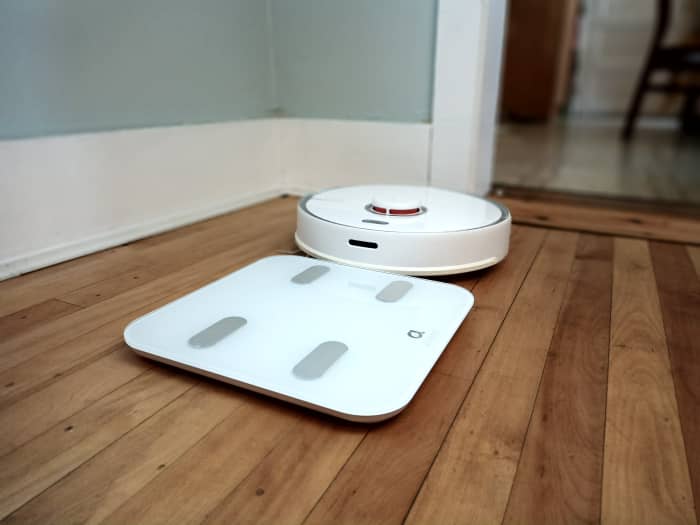 This smart scale works well with robotic vacuums. My robot carefully edges around the scale as it cleans the floor