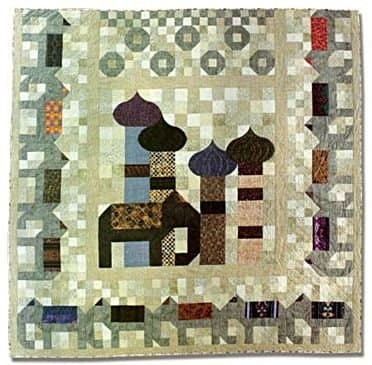Baby Elephant Walk. Completely quilted and bound with a walking foot on my Bernina. Queen size bed quilt, designed in Electric Quilt 5.