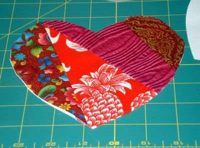 You can applique the heart to any other fabric to make a pretty block for a heart quilt.