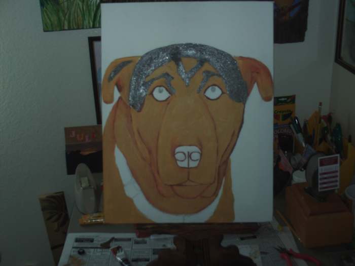 Gray tones of paint are used here to achieve the dark portions on Buster's cranium and ears.