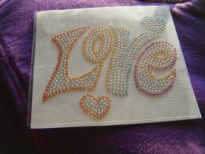How to Glue and Iron Rhinestones Onto Shirts and Clothes
