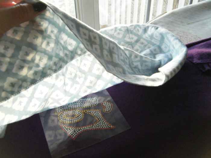 Put a cotton pillowcase (or other fabric) over the appliqué.