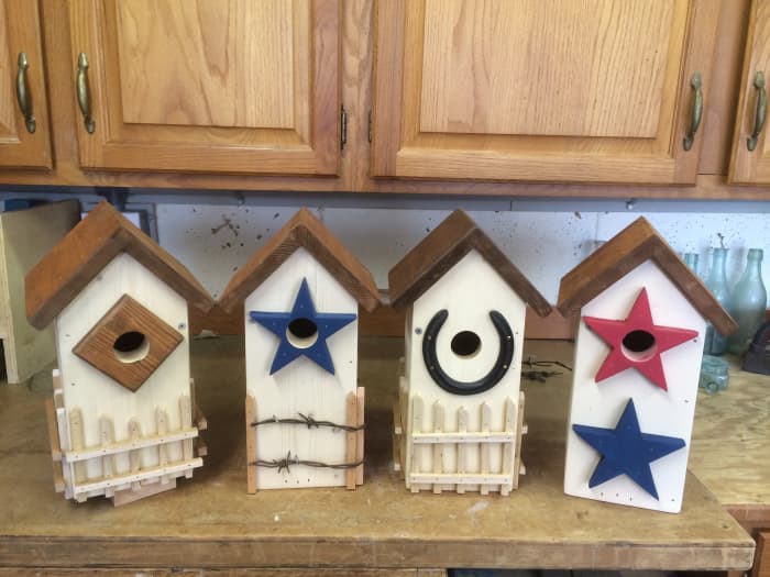 Into unique and customized yard art that the birds will actually use! Variations on a theme: Four different bluebird houses from the same basic design.