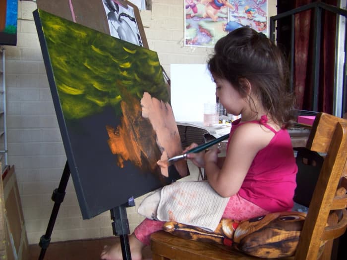 This is a step-by-step painting by a 3-year-old of a giant blue dog. She starts by painting over the entire canvas to make a background for her dog. Great artists do this all the time. It's called under-painting.