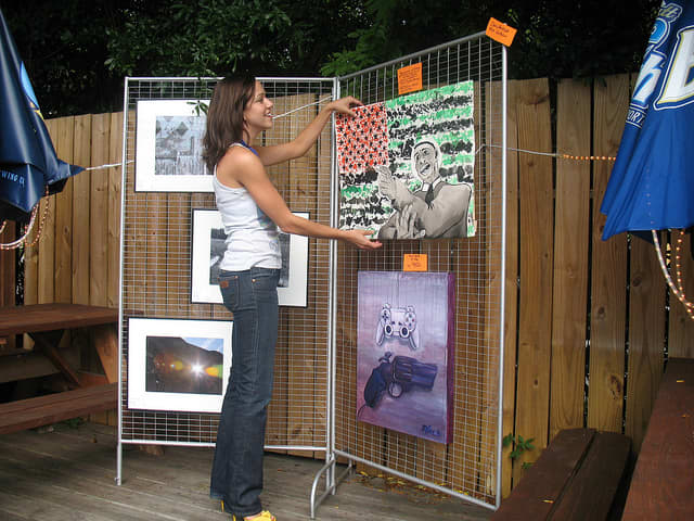 Making sure that your artwork is properly displayed, and prices are marked will help make the sale at an arts festival or crafts show.