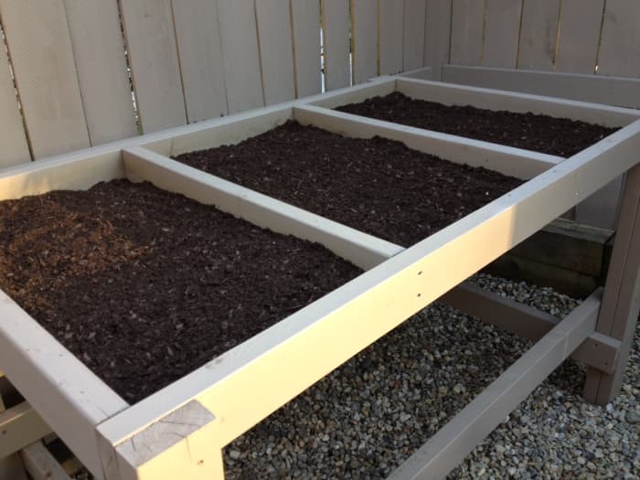 Be sure to fill each compartment with soil to the top. The soil will settle slightly over time.