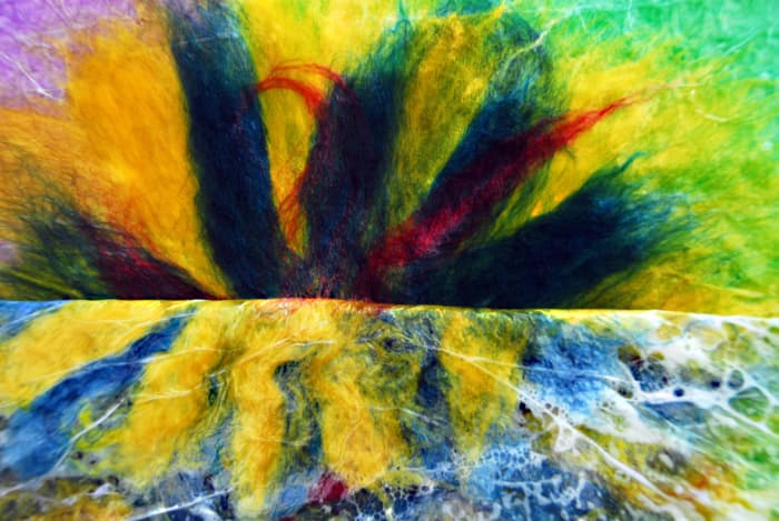 Lift the plastic and check to see that the central core of the flower is felted together.